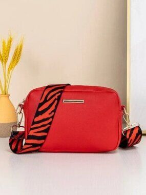 New Mini crossbody with zebra guitar strap